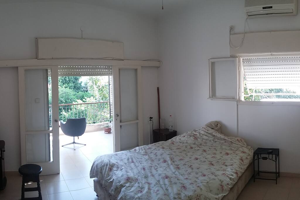Bedroom with exit to front porch for a relaxed morning