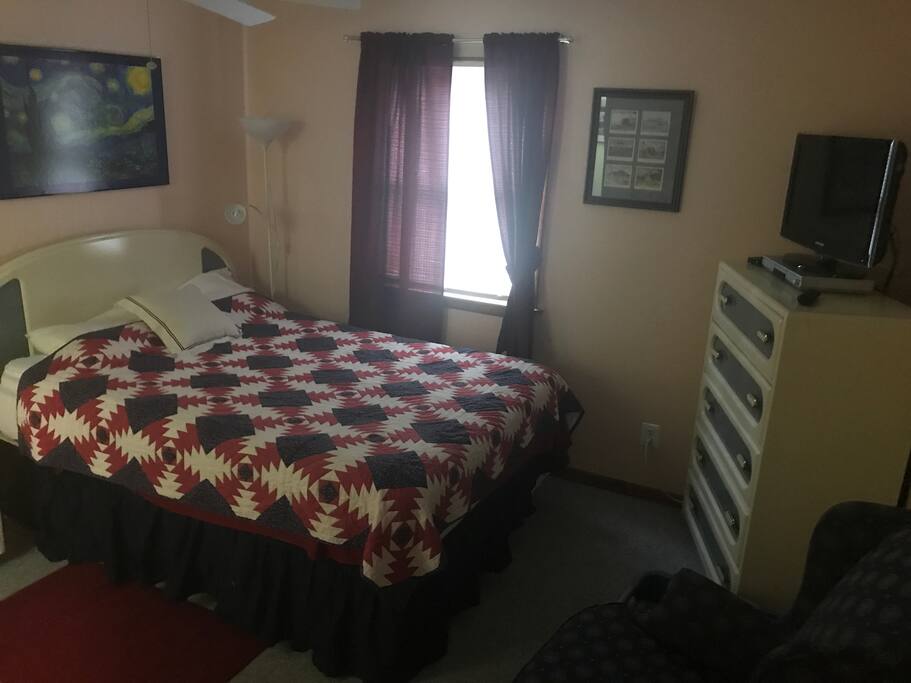 Queen bed in master bedroom