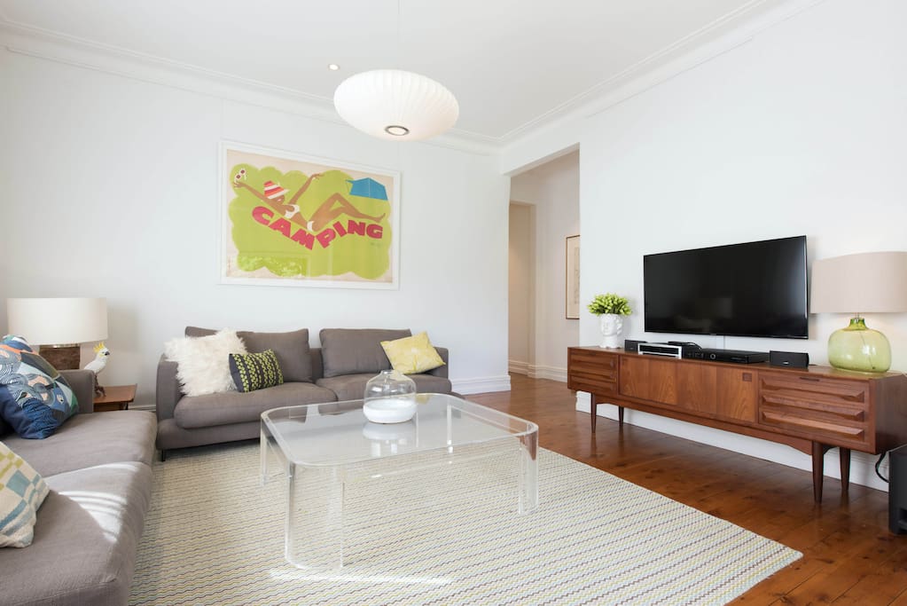 Big screen TV and designer furnishings.