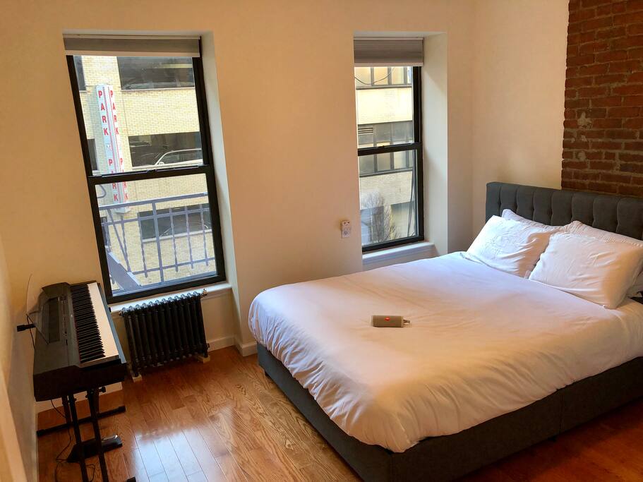 Master bedroom and bluetooth speaker. Towels are provided :) (The Piano is not in the room anymore, more space for you!)