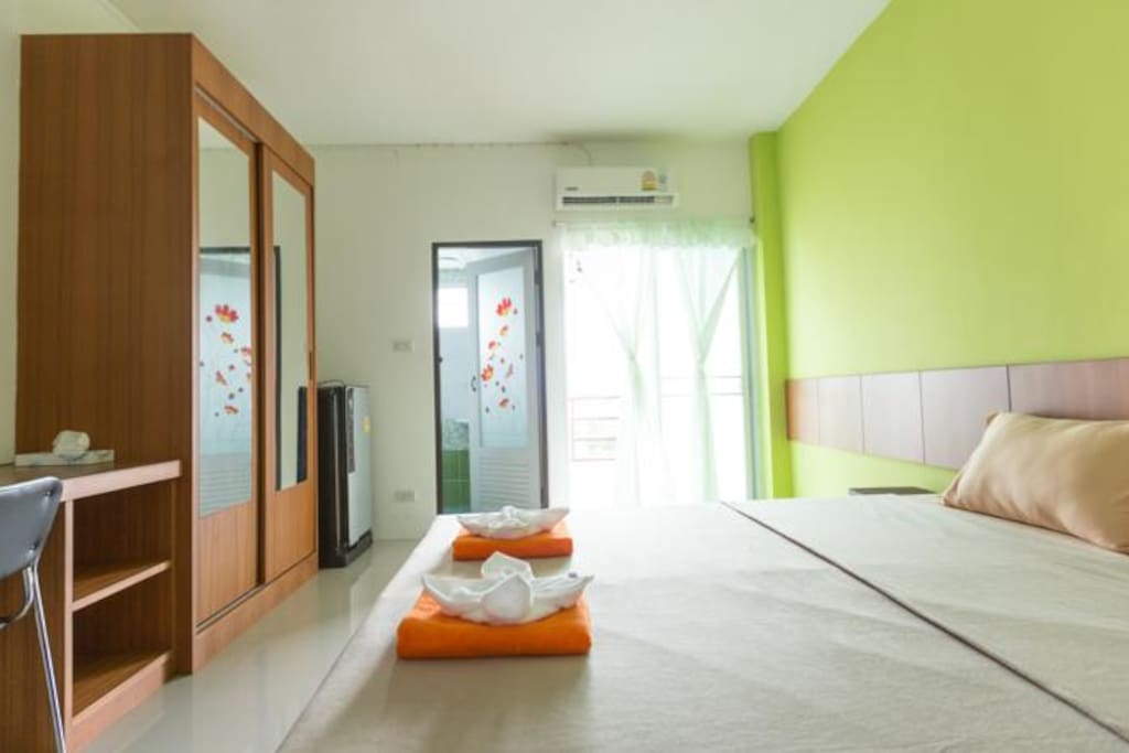 The apartment has a queen bed, air conditioner and private bathroom and fridge for your use.