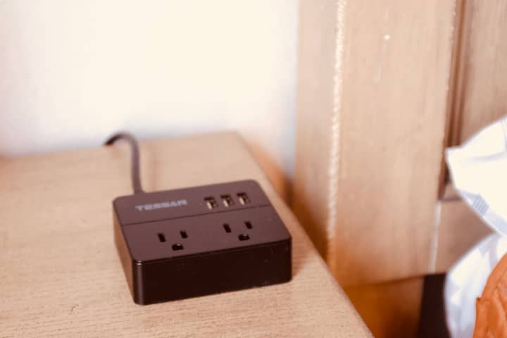 On each night stand is a combination charge with three usb connections and two regular plugs making getting connected and charged a breeze.