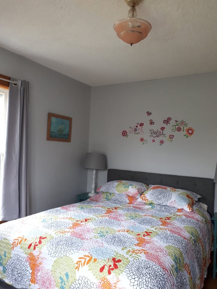 Bedroom 5 - Added privacy, with a queen bed, desk and closet in this room. This room is right next to the bathroom.