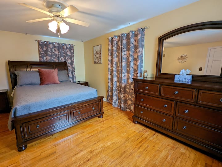 The Queen room offers lots of natural light, a comfy mattress, and as always, extra comfy sheets. You will have plenty of drawer space to put clothing including a nice unique closet to hang items.