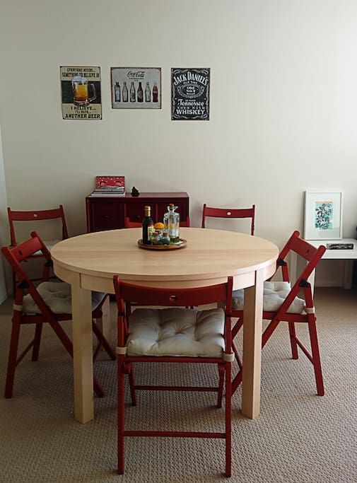The table is expandable, there are 2 more chairs and another seat.