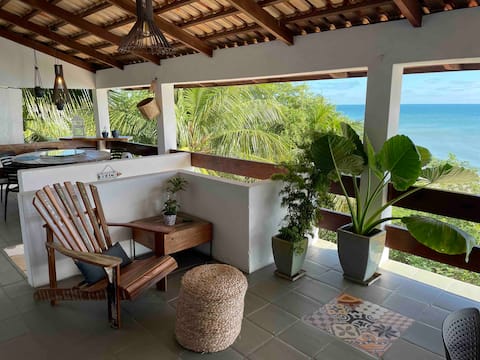 Beach House satnding in the Sand