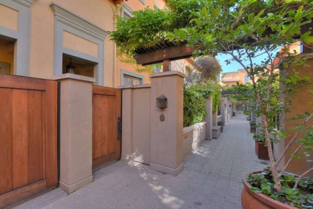 Entrance to the unit through a 'Mediterranean Garden'.