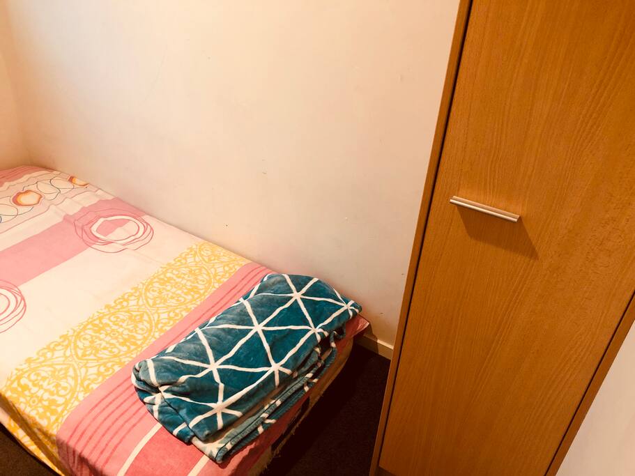Bed and cupboard
