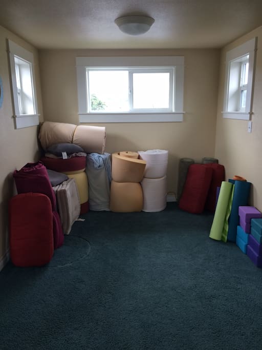 roll up pads you can use to make beds, yoga mats and tons of yoga blocks as well