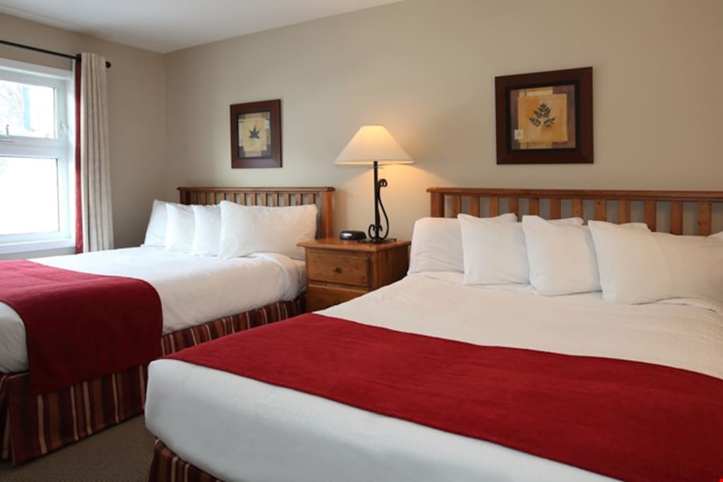 In the master bedroom, get a good night's sleep in either two queen beds or one king.