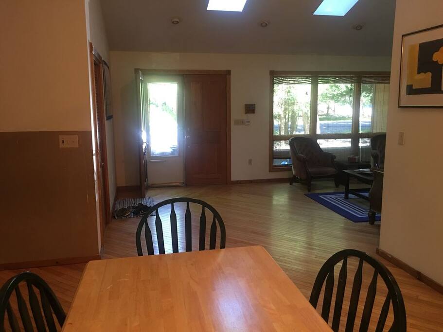 Dining room looking out to family room / skylights