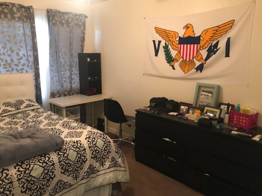 Bedroom with a desk and dresser drawer