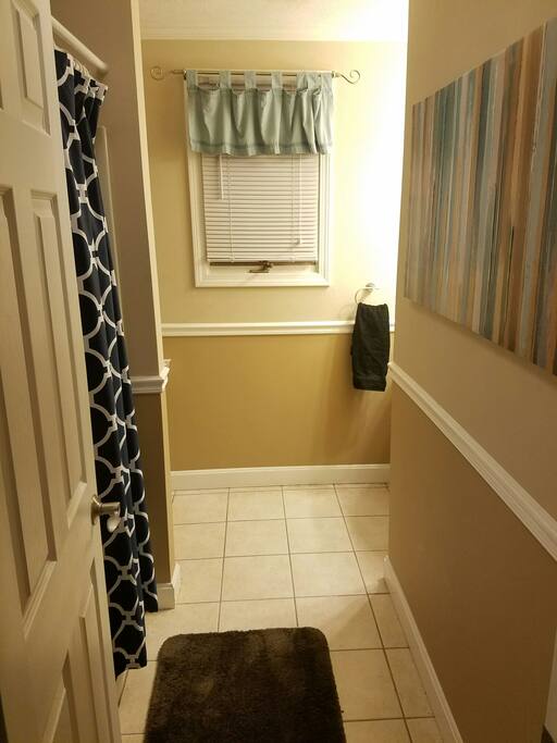 Shared Bathroom, with shower.