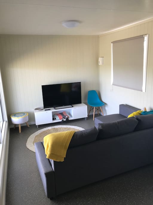 Lounge room. This lounge converts to a double bed and also has a split air conditioning / heating system installed