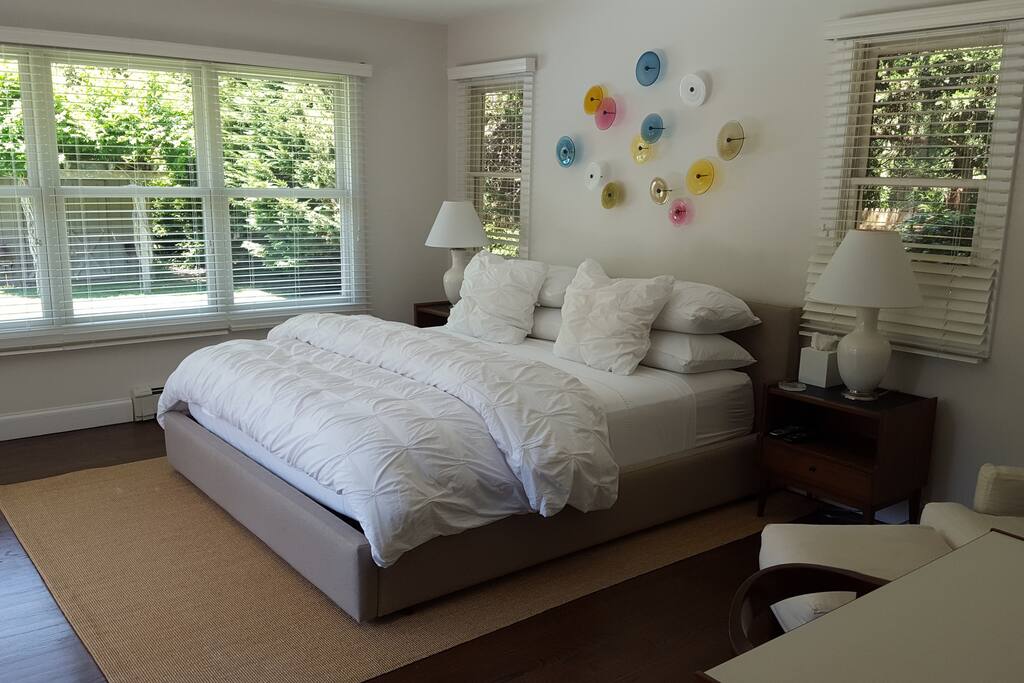 Gorgeous light and airy master overlooks back garden