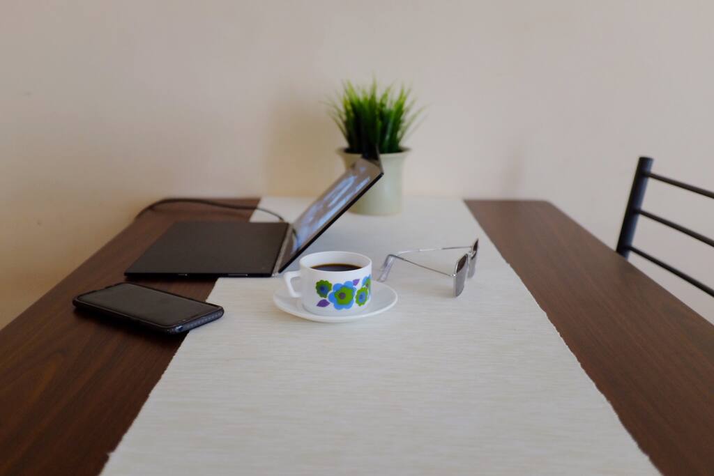 Dining table: be productive with a morning coffee in a cute vintage cup