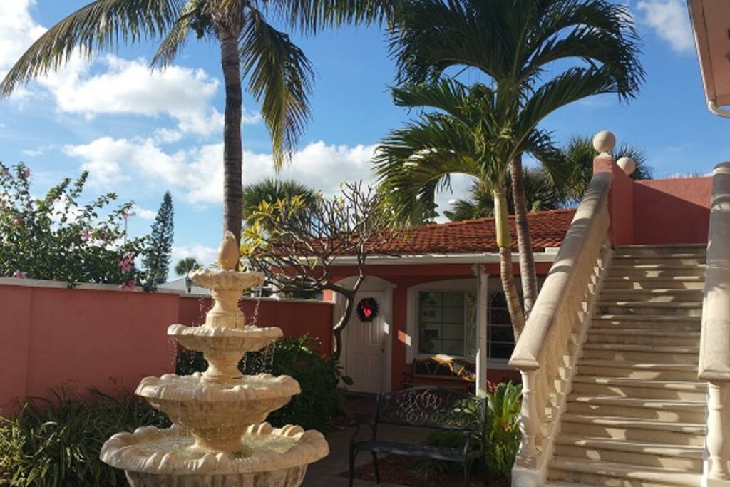 courtyard on property with fountain