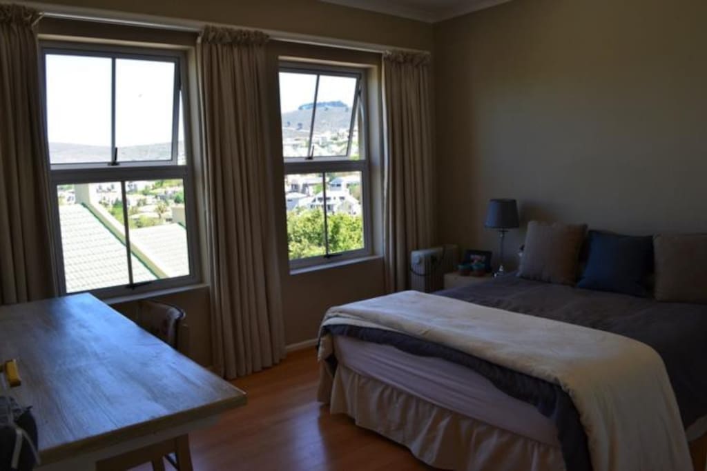 Second Bedroom has a queen sized bed, dressing table, cupboard space and a beautiful view. Has a separate bathroom (Shower in bath) but is not en-suite.