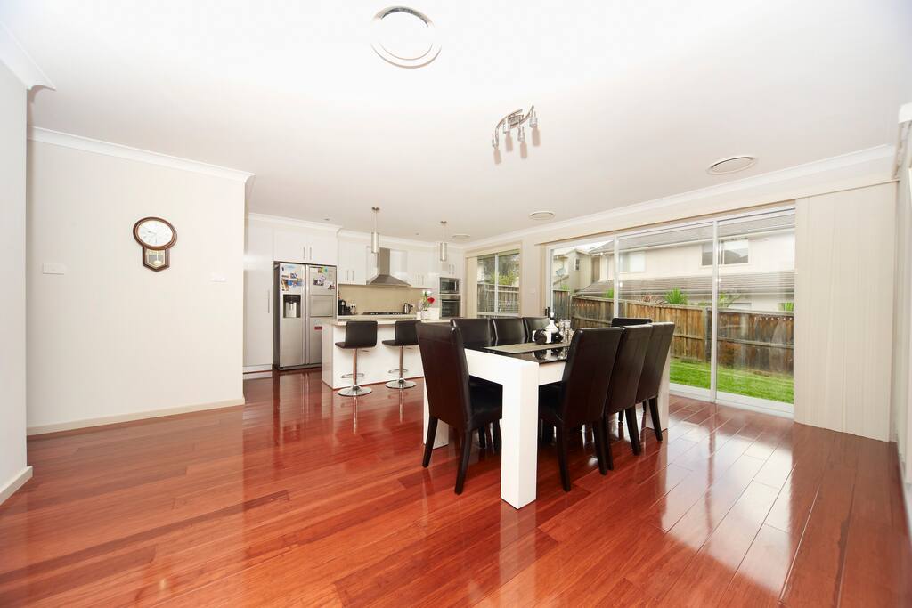 prepare your own dinner or entertain your guest in a modern and large dining and kitchen area.