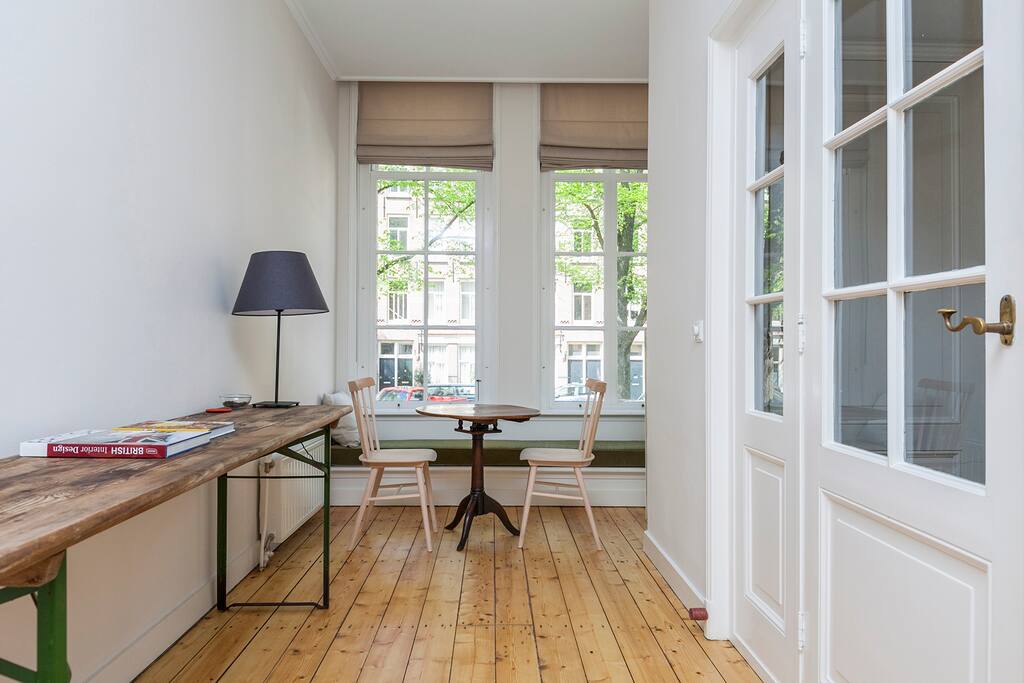 High windows, bright and spacious living room.