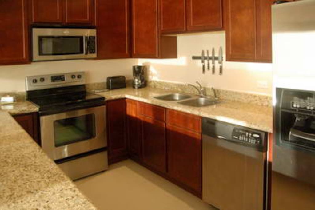beautiful well equipped kitchen makes cooking at home a joy