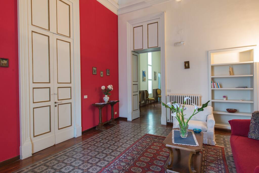 living room with a sofa bed king size