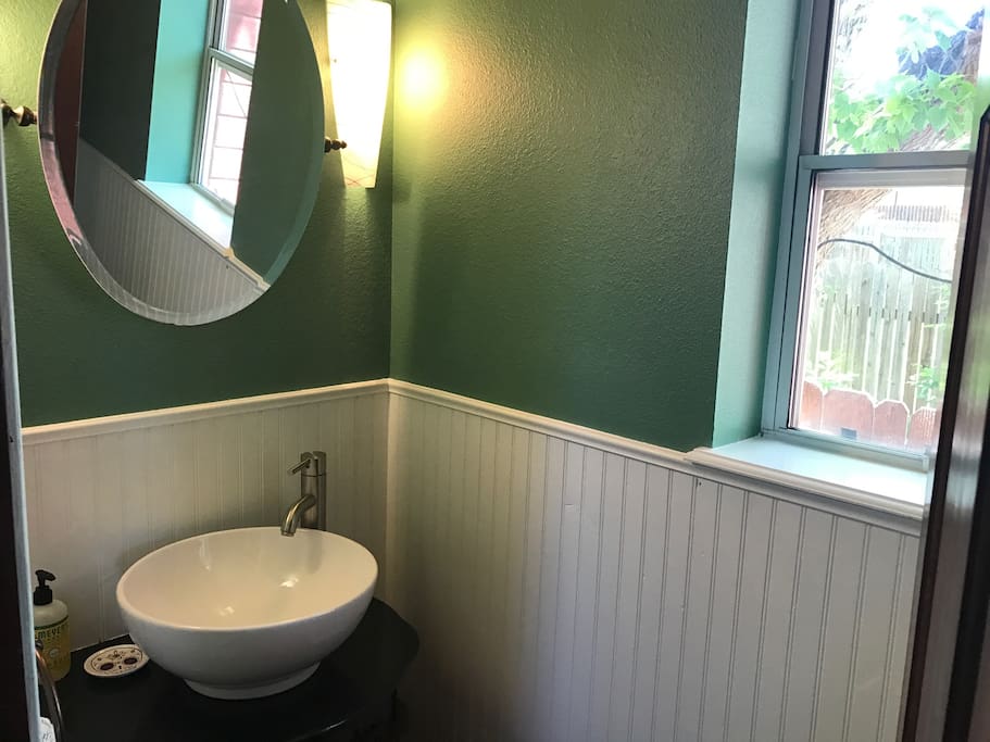 Your bathroom with storage under sink and above toilet.
