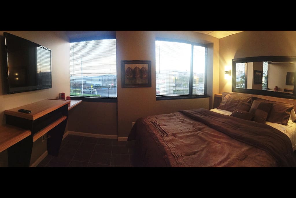The West Bedroom Features a King Size Bed and 32" Smart TV.
