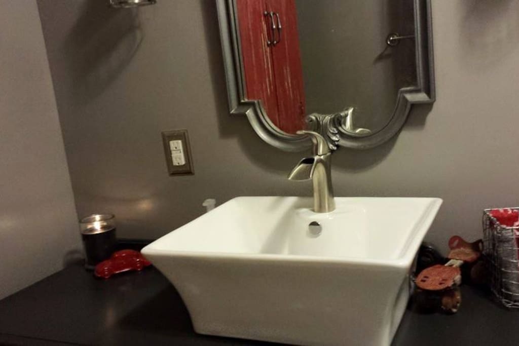 Shared bathroom with full bath.