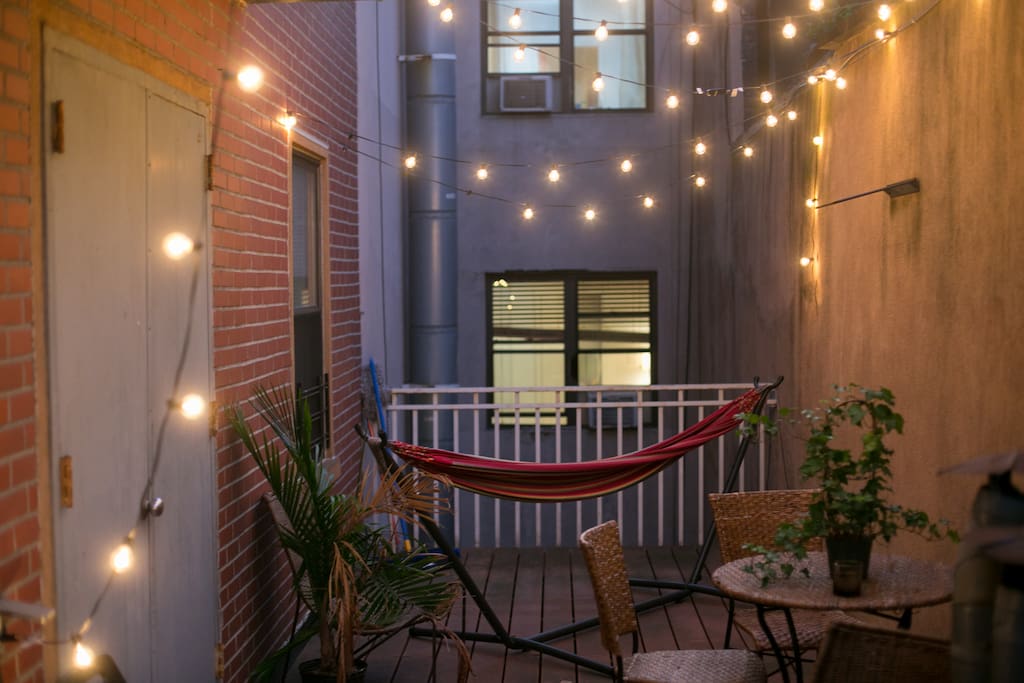 Perfect private patio for late night wine or reading or spending time in the hammock.
