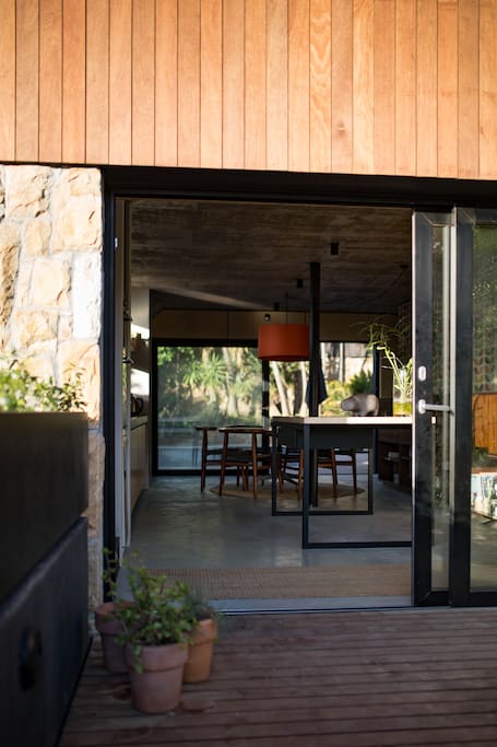 kitchen/dining opening to courtyard & pool