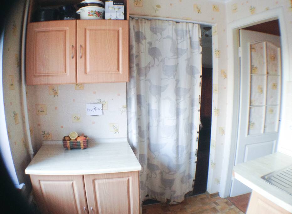 the only strangeness
about our kitchen is that there was not enough place for the fridge, that's why it stands in my room right behind the curtain which you can see on the photo