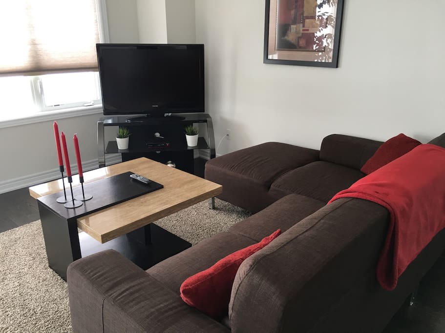 Modern brand new brown couch with chaise lounge. Rogers cable and Wifi included