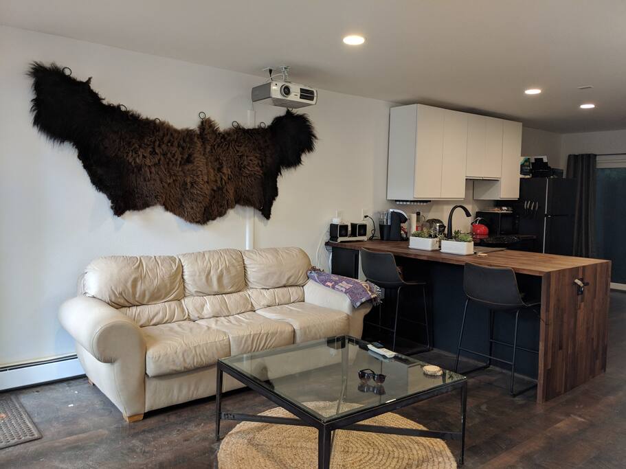 Pullout couch is a full size, and acts as the 3rd sleeping area.