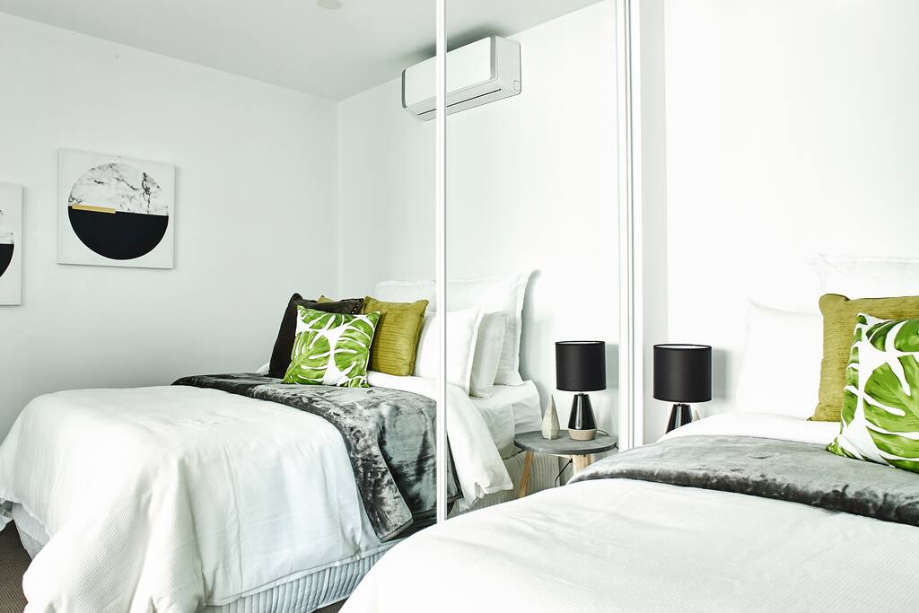 Large beds with the attached AC in the room