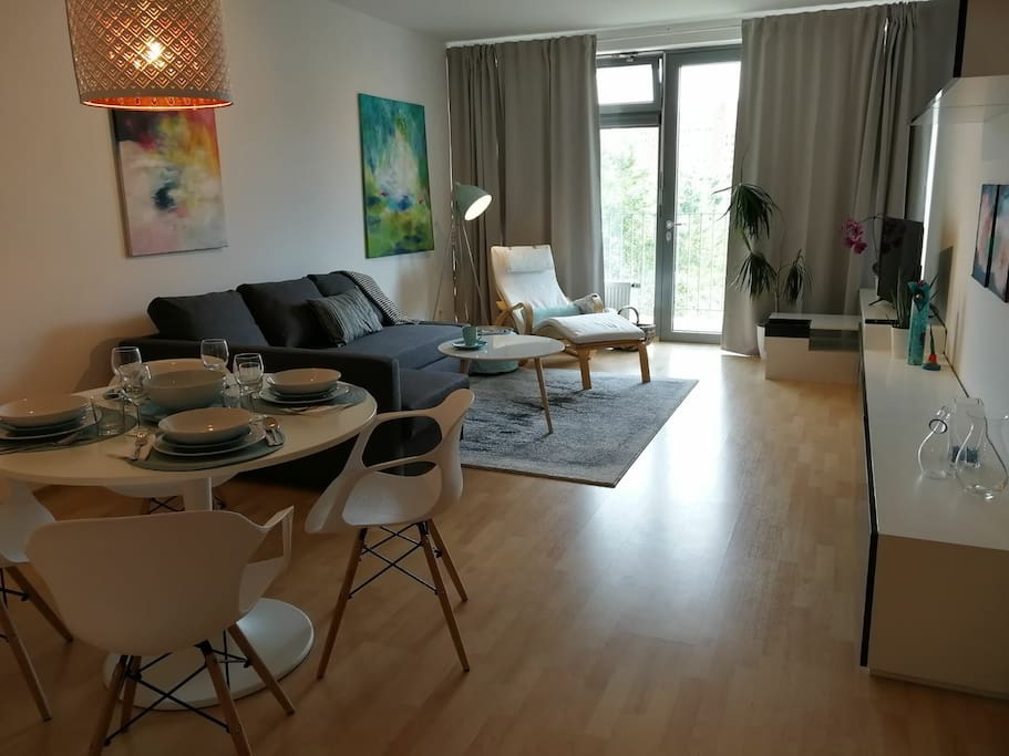 Livingroom connected with kitchen and dining space