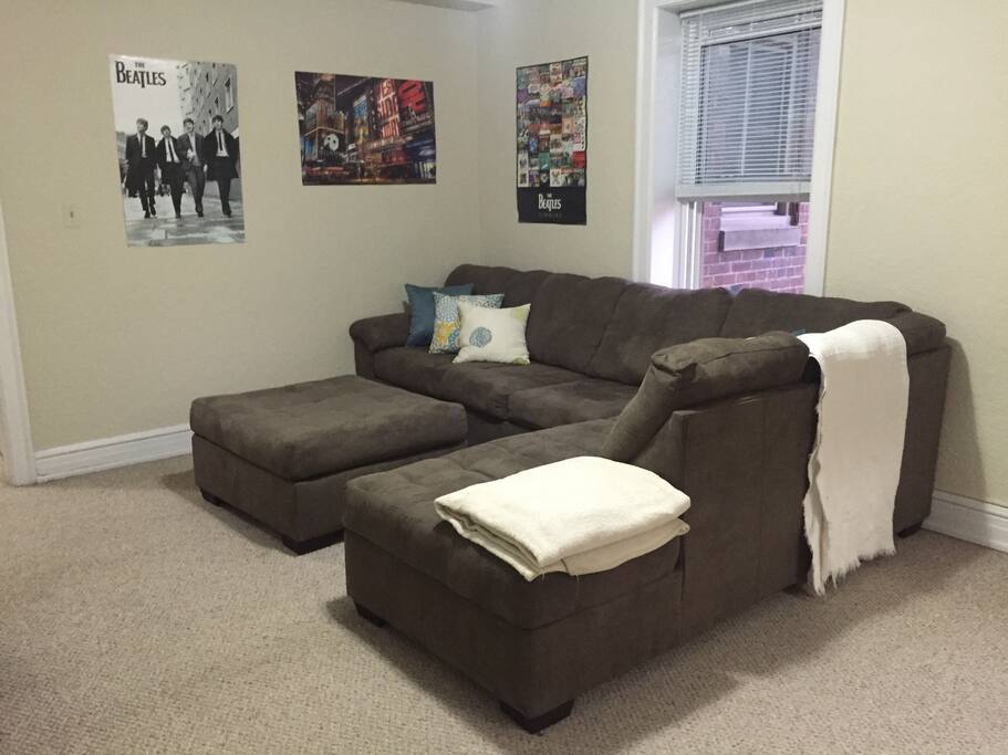 Living room couch comfortably sleeps 2