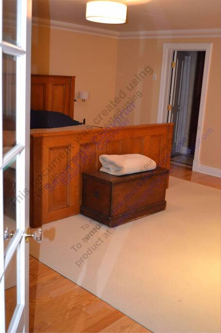 Bedroom with queen size bed.