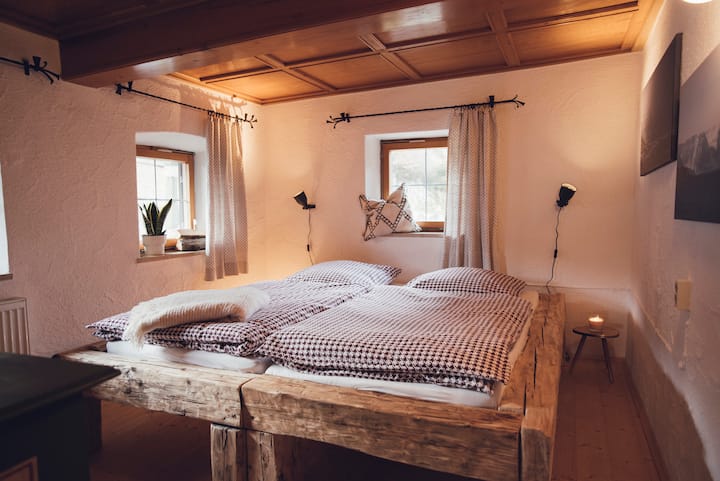 The Enzian room with a queen bed