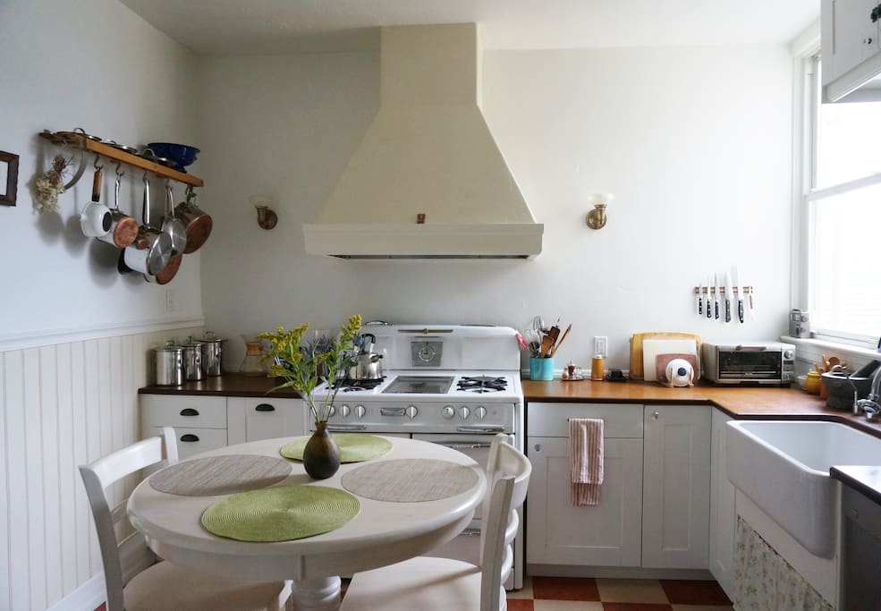 Well-lit kitchen with amenities for those who like to cook good meals or just like being in a kitchen.