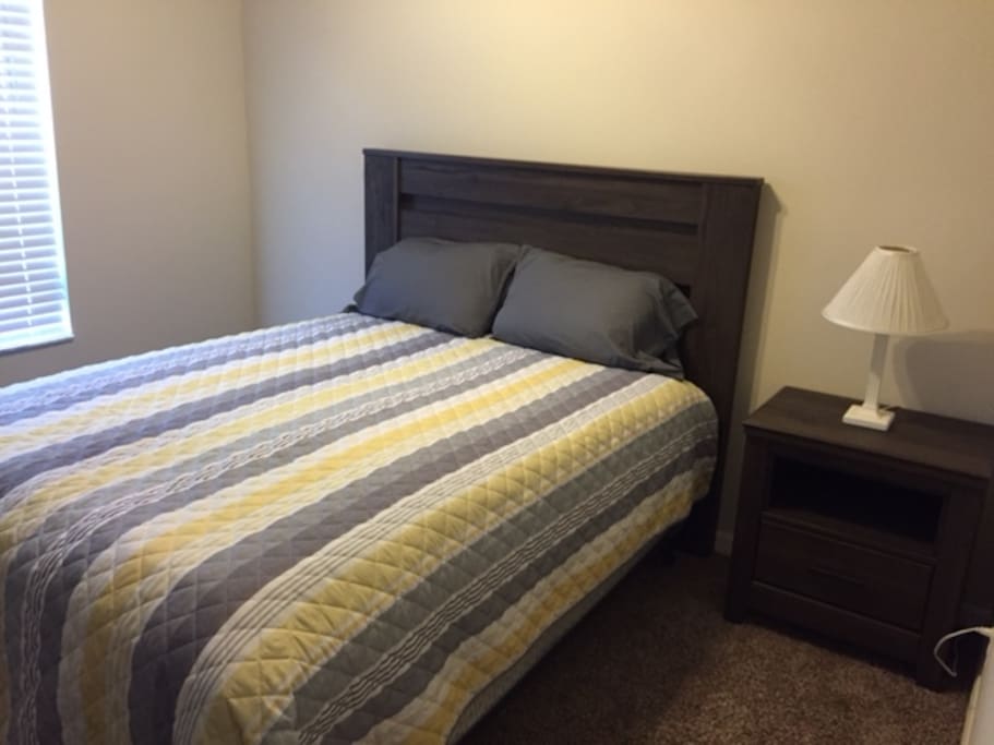 Queen bed, 1 set of towels, bedding, night stand, 1 lamp