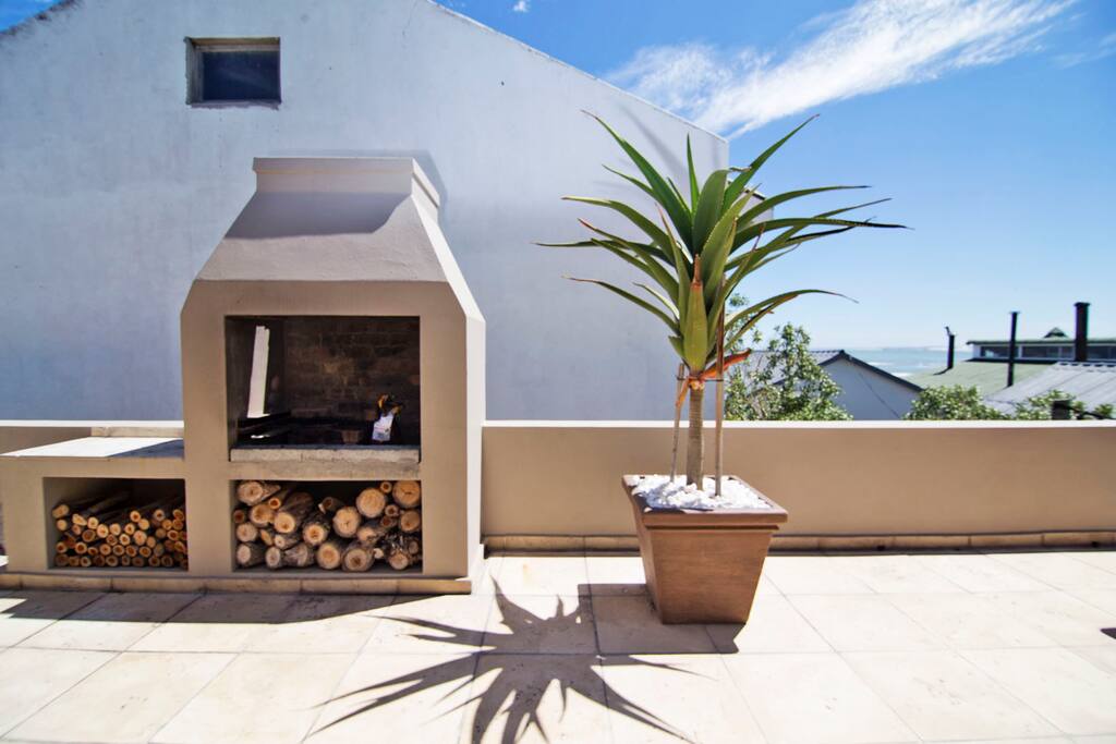 Outdoor BBQ area with sea views. Enjoy the summer and sunsets!