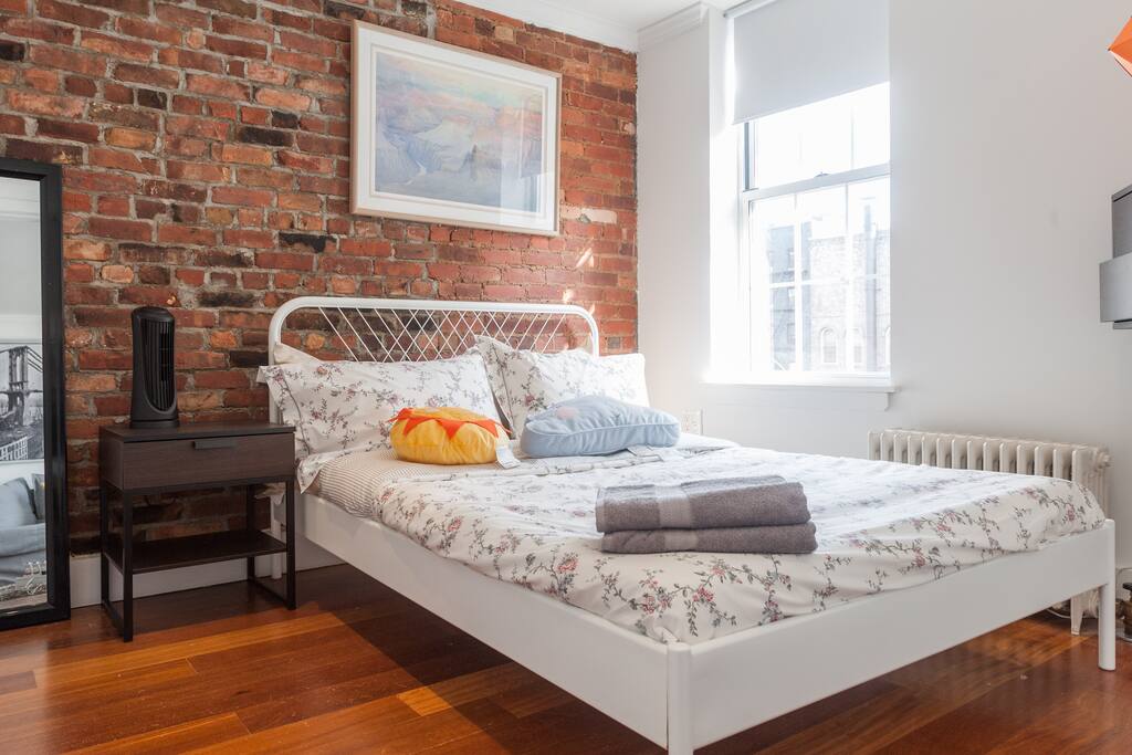 The first bedroom gets tons of light and has multiple storage areas for gear and luggage.