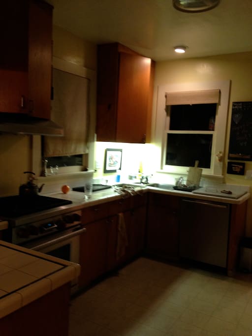Kitchen has wolf stove and Bosch Dishwasher. Amana refrigerator