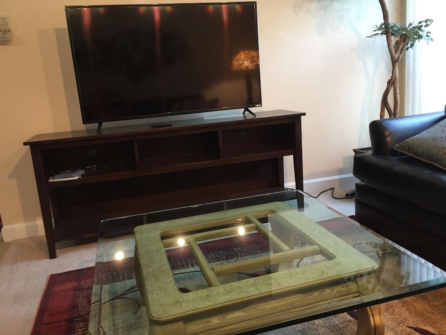 Coffee table in front of TV