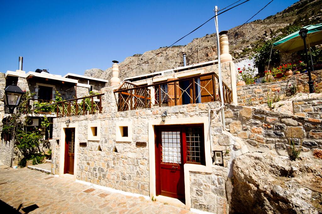 Two-storey stone-built house with great terrace.
