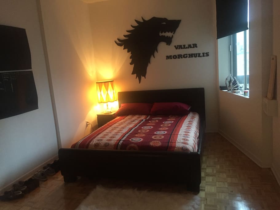 Queen sized bed with a private closet for your belongings.