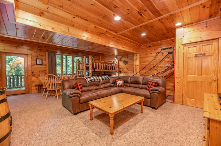 Downstairs game room, complete with Queen over Queen log bunk beds