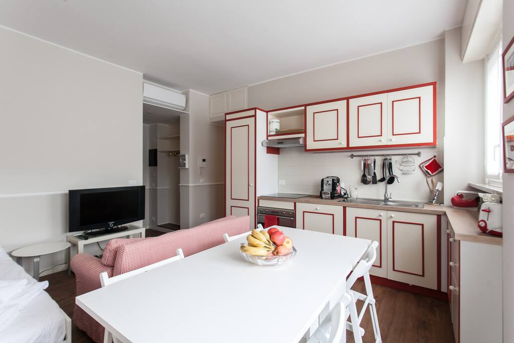 Living area: double bed & sofa, TV - equipped kitchen & dining table x4