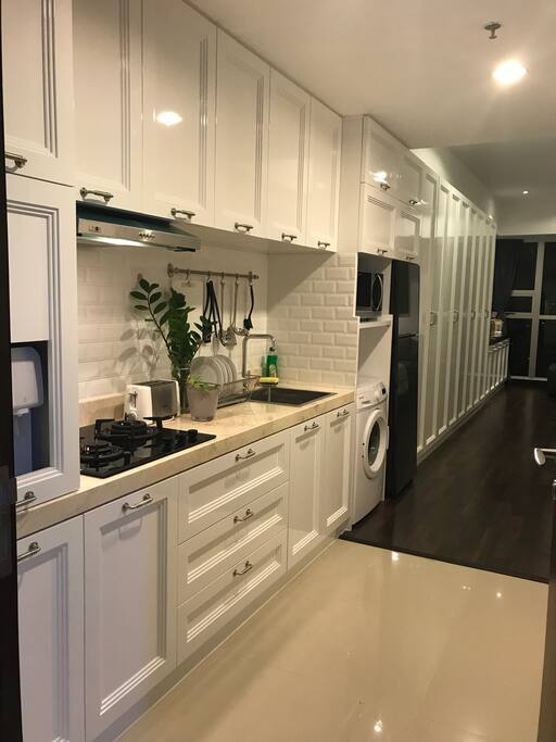 Spacious hallway leading to sleeping & sitting area